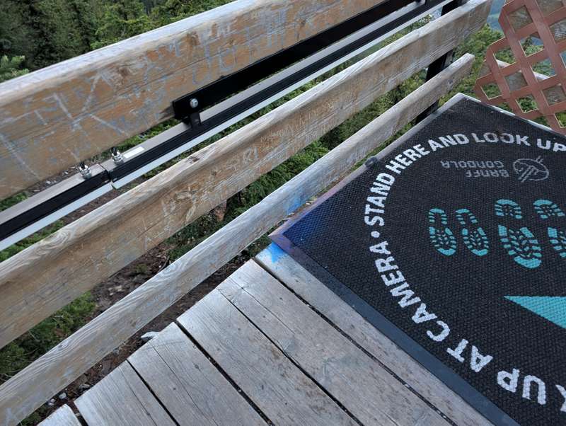 Stains from a blue smoke bomb on a wooden boardwalk