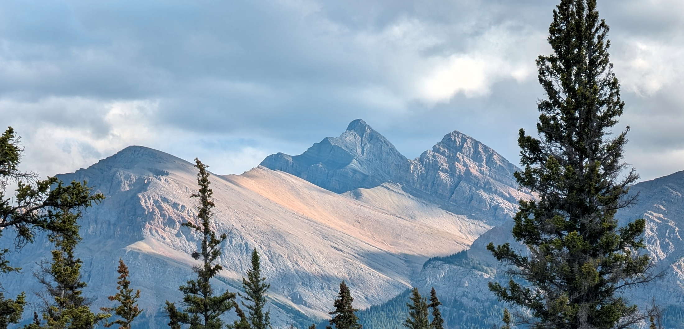 Photograph of a distant alpine summit