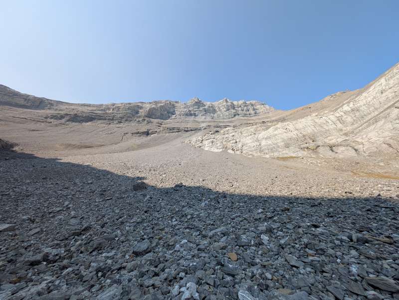A scree slope leads towards Hope Peak's summit.