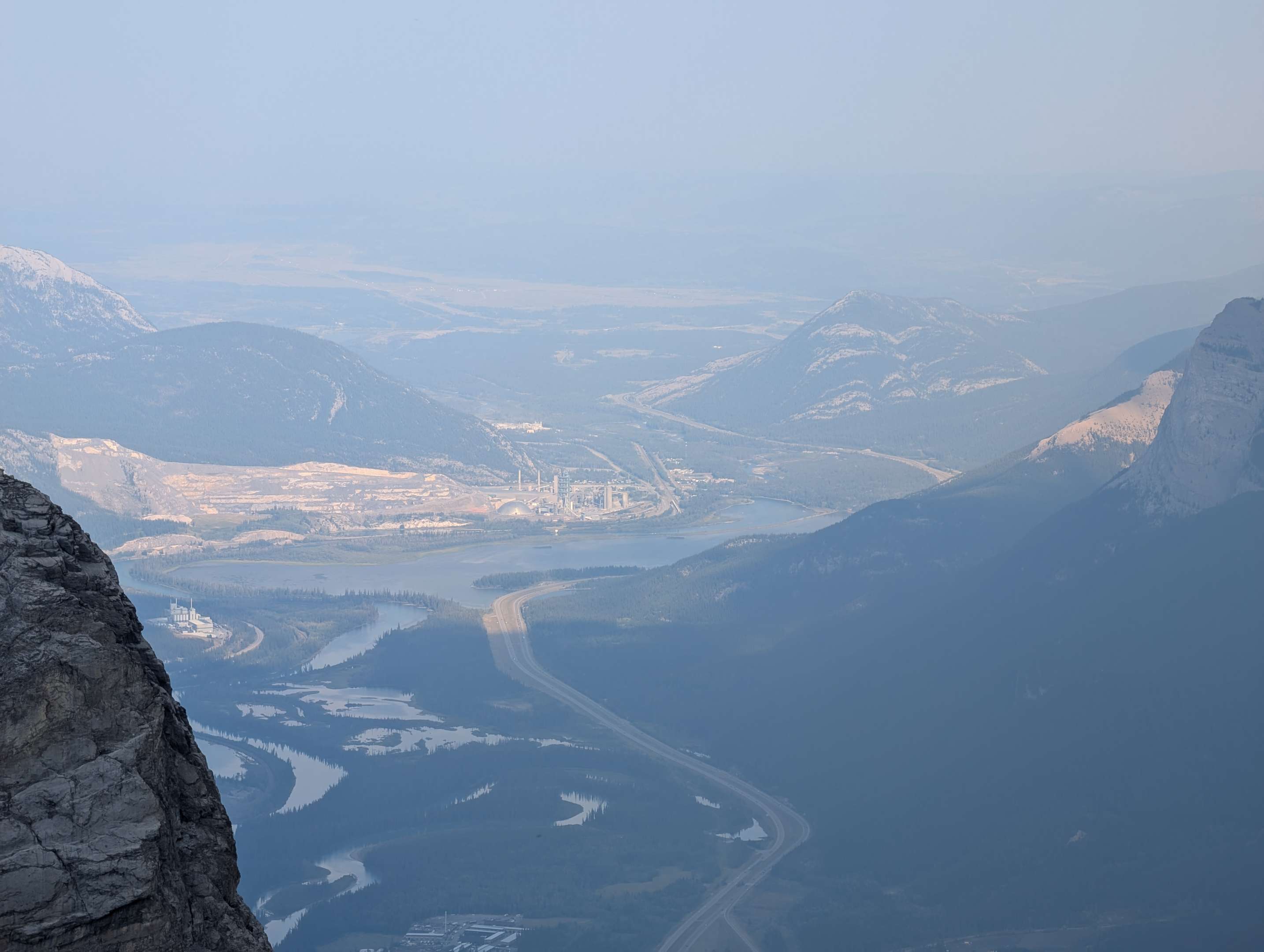 Smoky skies over Canmore and the surrounding area, viewed from Hope Peak.