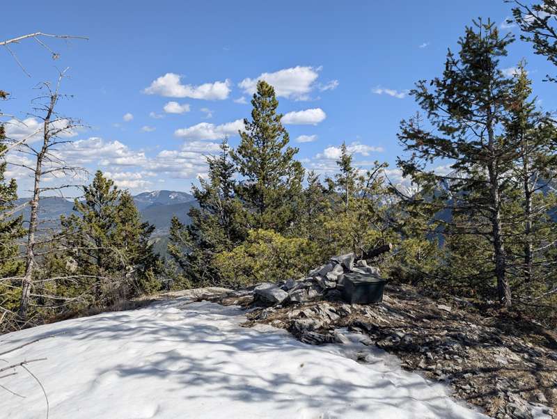 The summit cairn of Exshaw Mountain